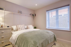 Bedroom One- click for photo gallery